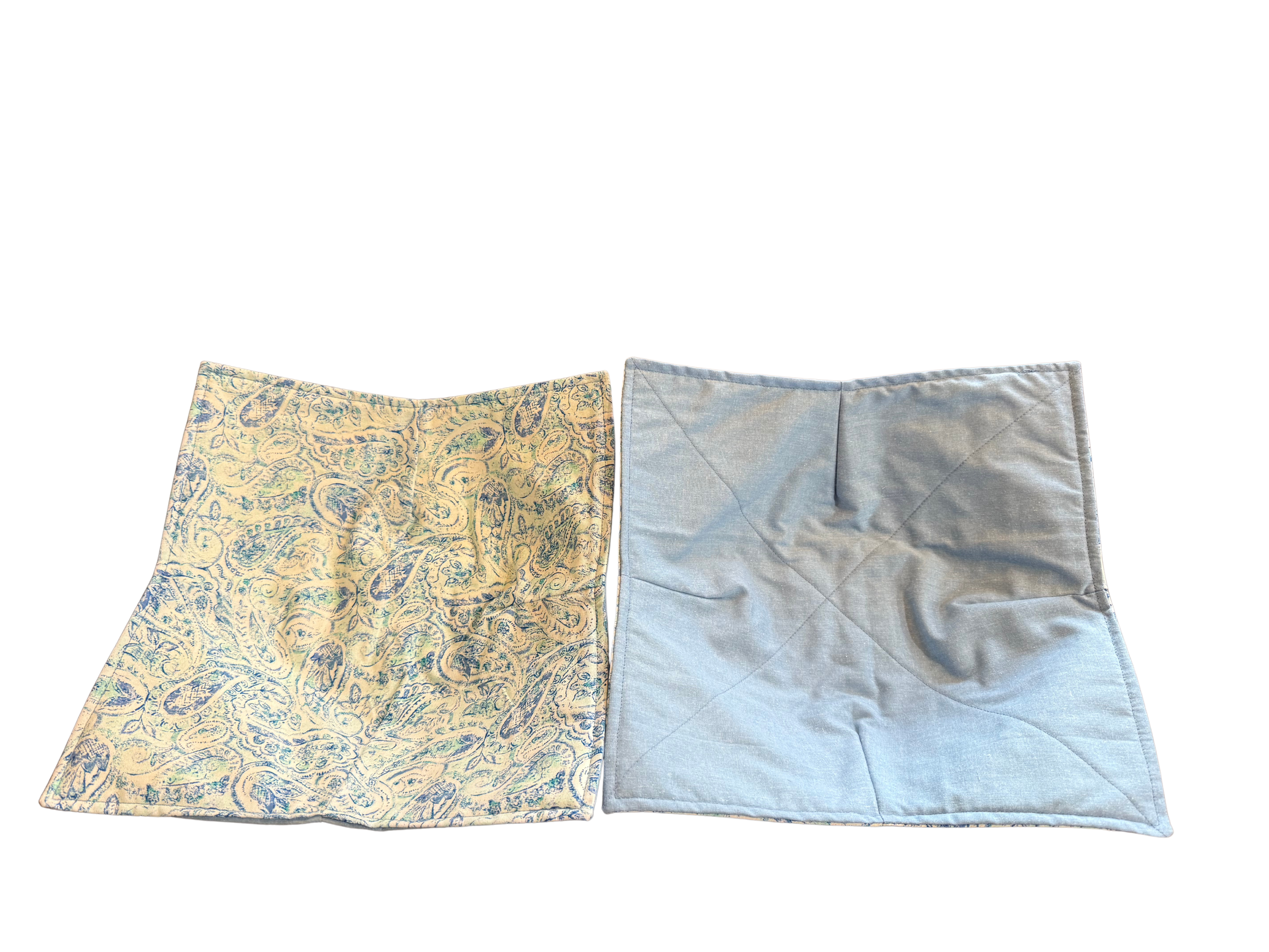 Two fabric swatches, one with a yellow and blue pattern and the other plain light blue, on a white background.