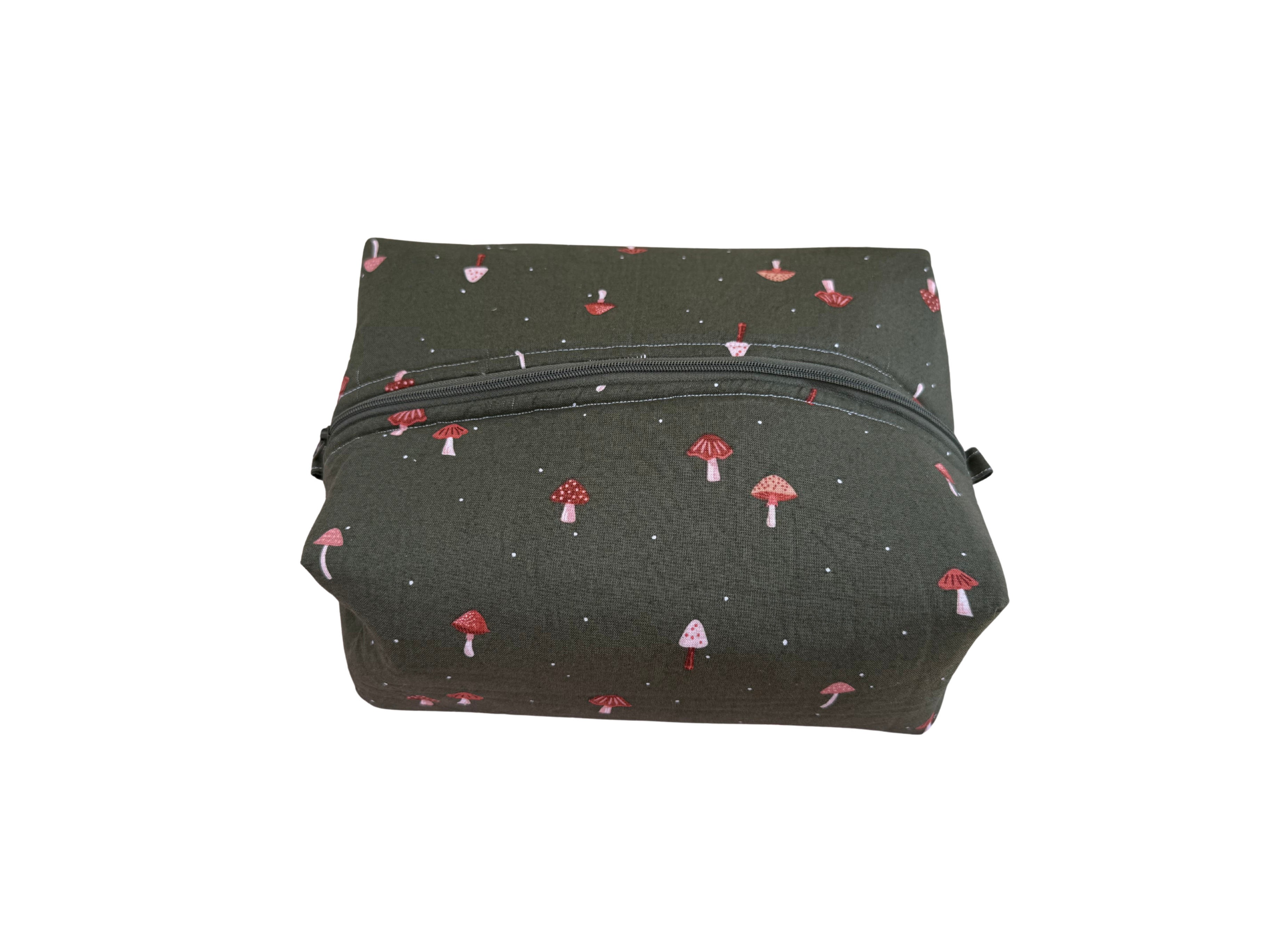 dark green make up bag with red mushroom fabric