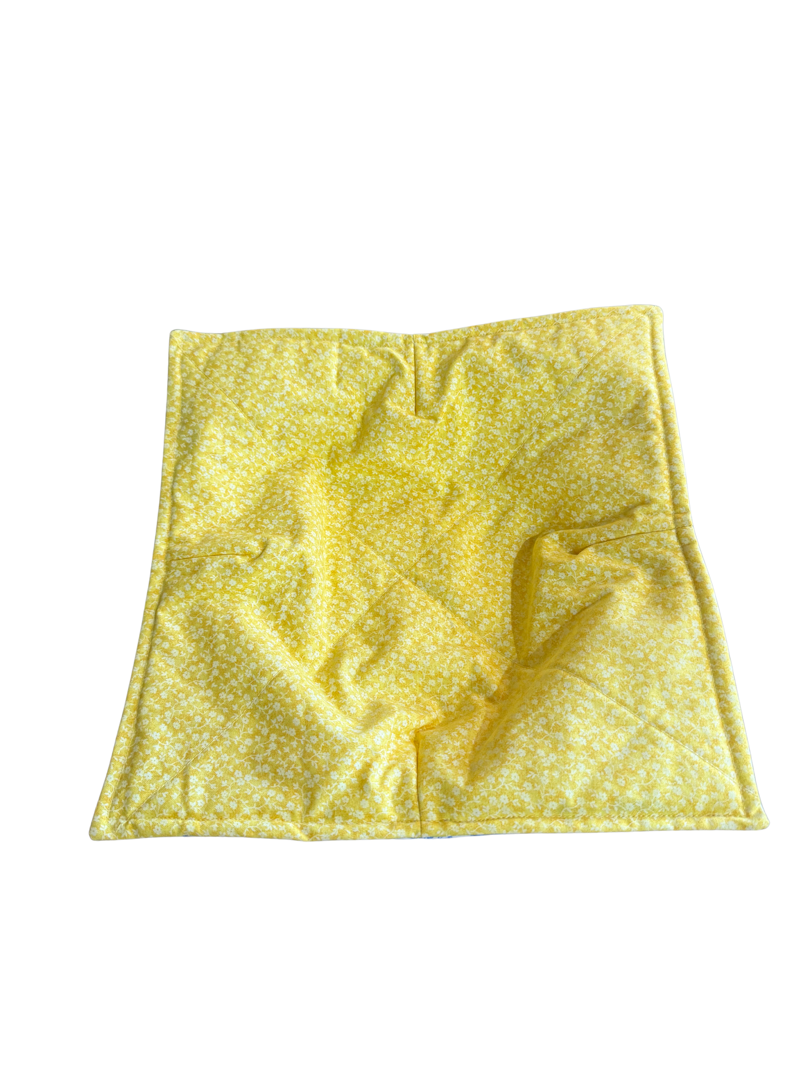 Yellow fabric square on a white background