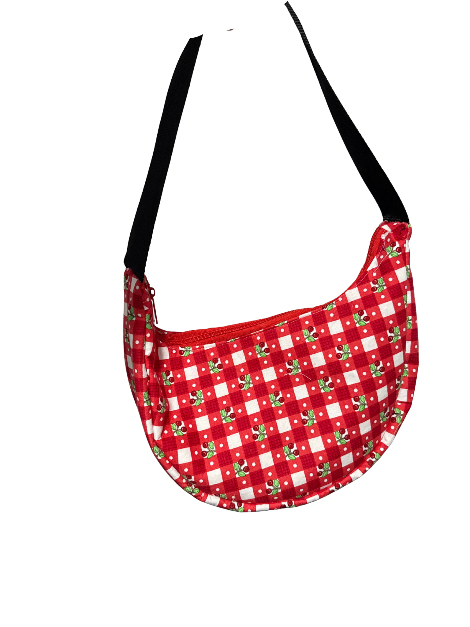 Red checkered bag with black straps on a white background