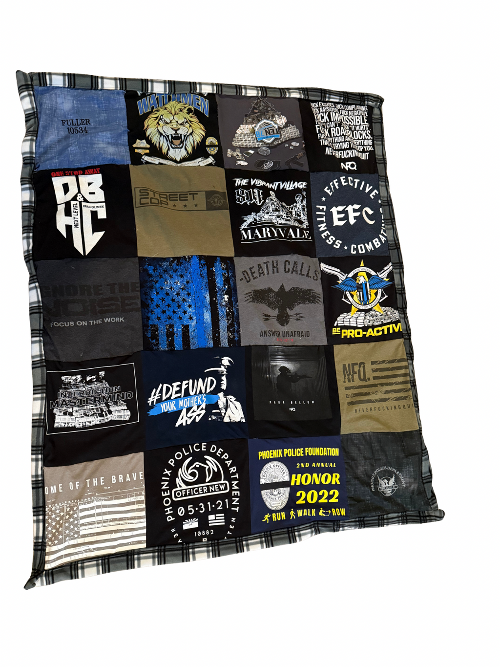Quilt with various graphic t-shirt designs on a white background