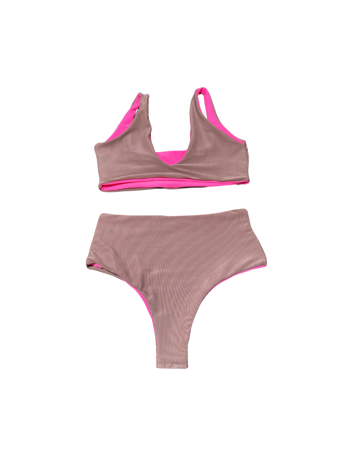 Pink bikini set with ribbed texture on a white background