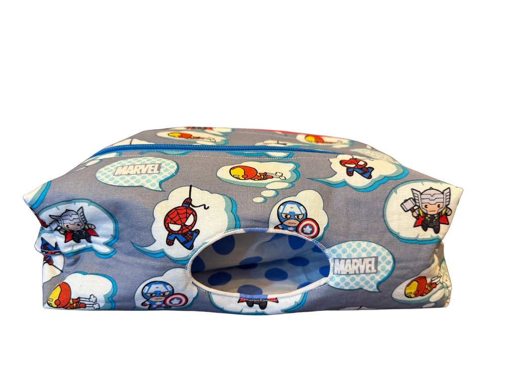 Marvel-themed fabric with superhero characters on a gray background