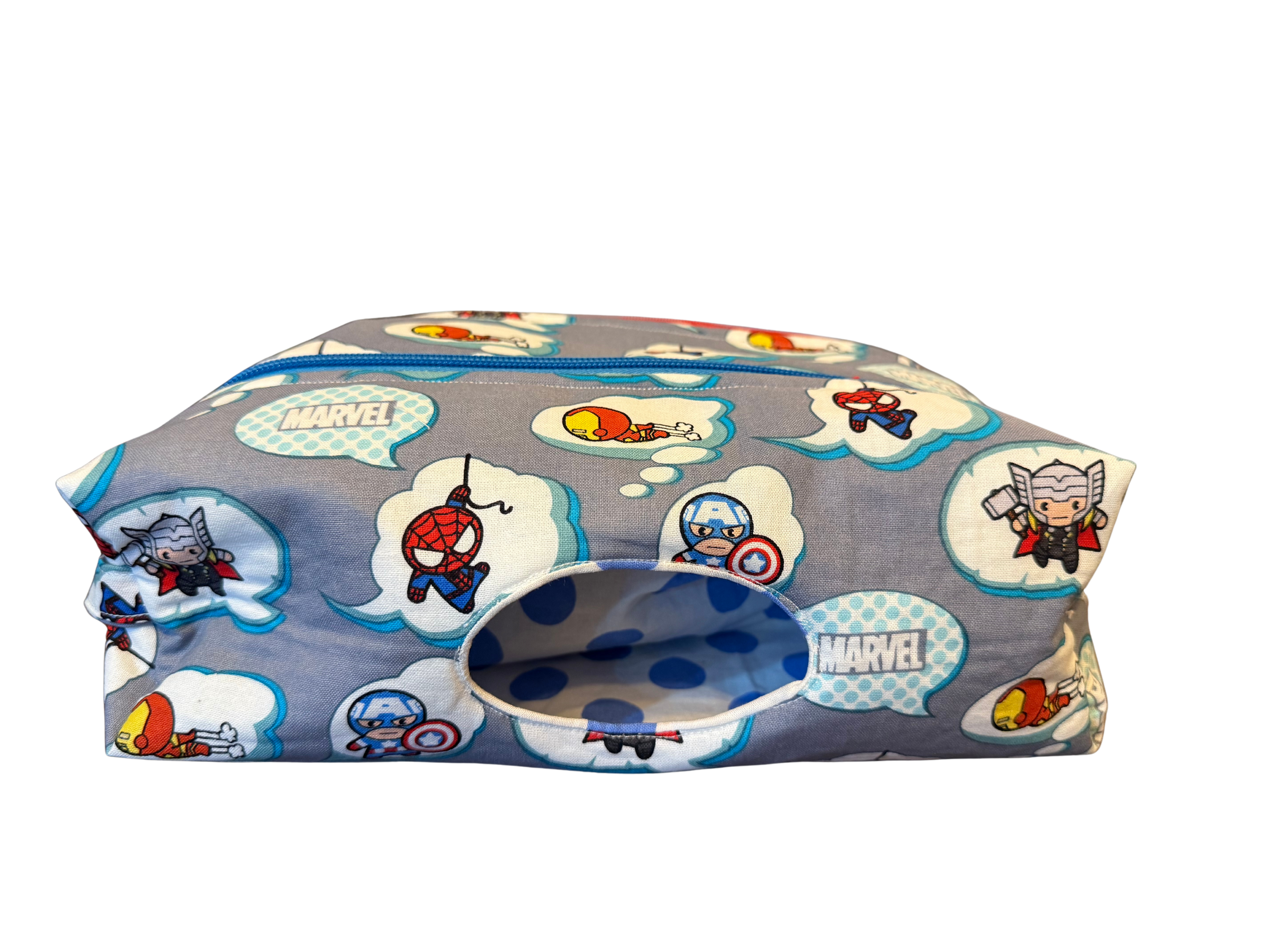 Marvel-themed fabric with superhero characters on a gray background