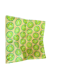 Fabric with lime pattern on a white background